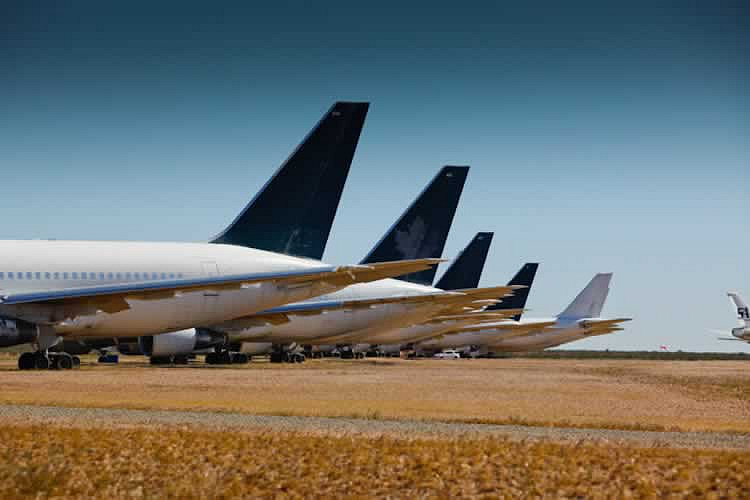 Rows of airliners in storage at the Mojave Airport in the California desert