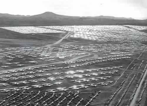 Aircraft parked and awaiting sale, or the furnaces, at Kingman AAF after World War II