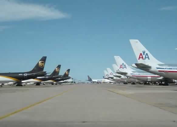 Lines of UPS and American Airlines jets in storage at the Roswell International Air Center in New Mexico